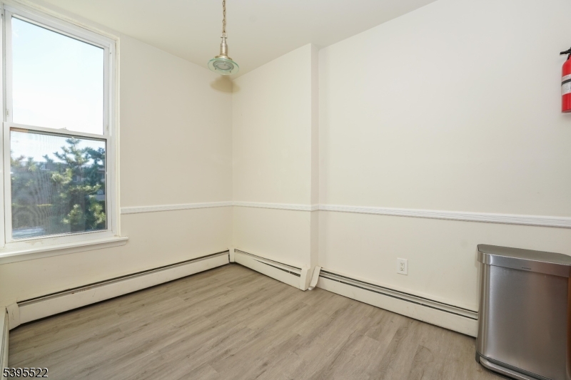 1 River Road Nutley, NJ 07110 - Photo 13 of 27 a view of a room with wooden floor and white walls