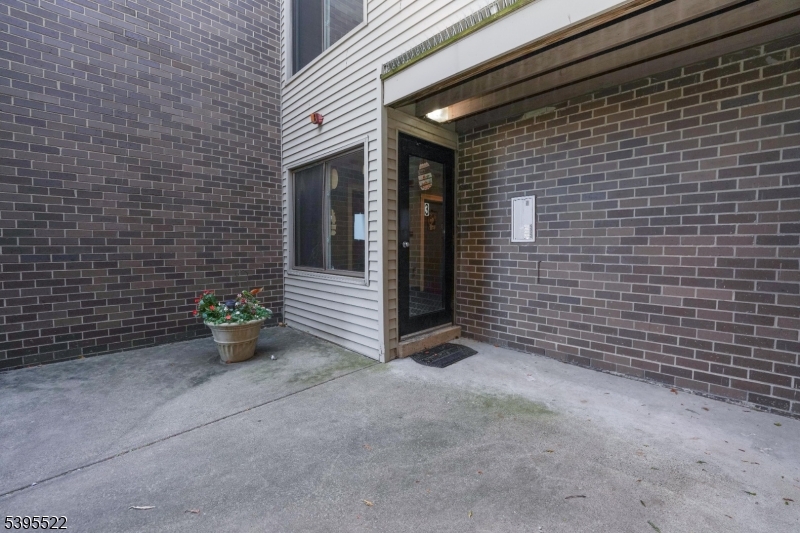 1 River Road Nutley, NJ 07110 - Photo 24 of 27 a view of an outdoor space with wooden fence