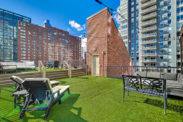 a view of a building with a yard