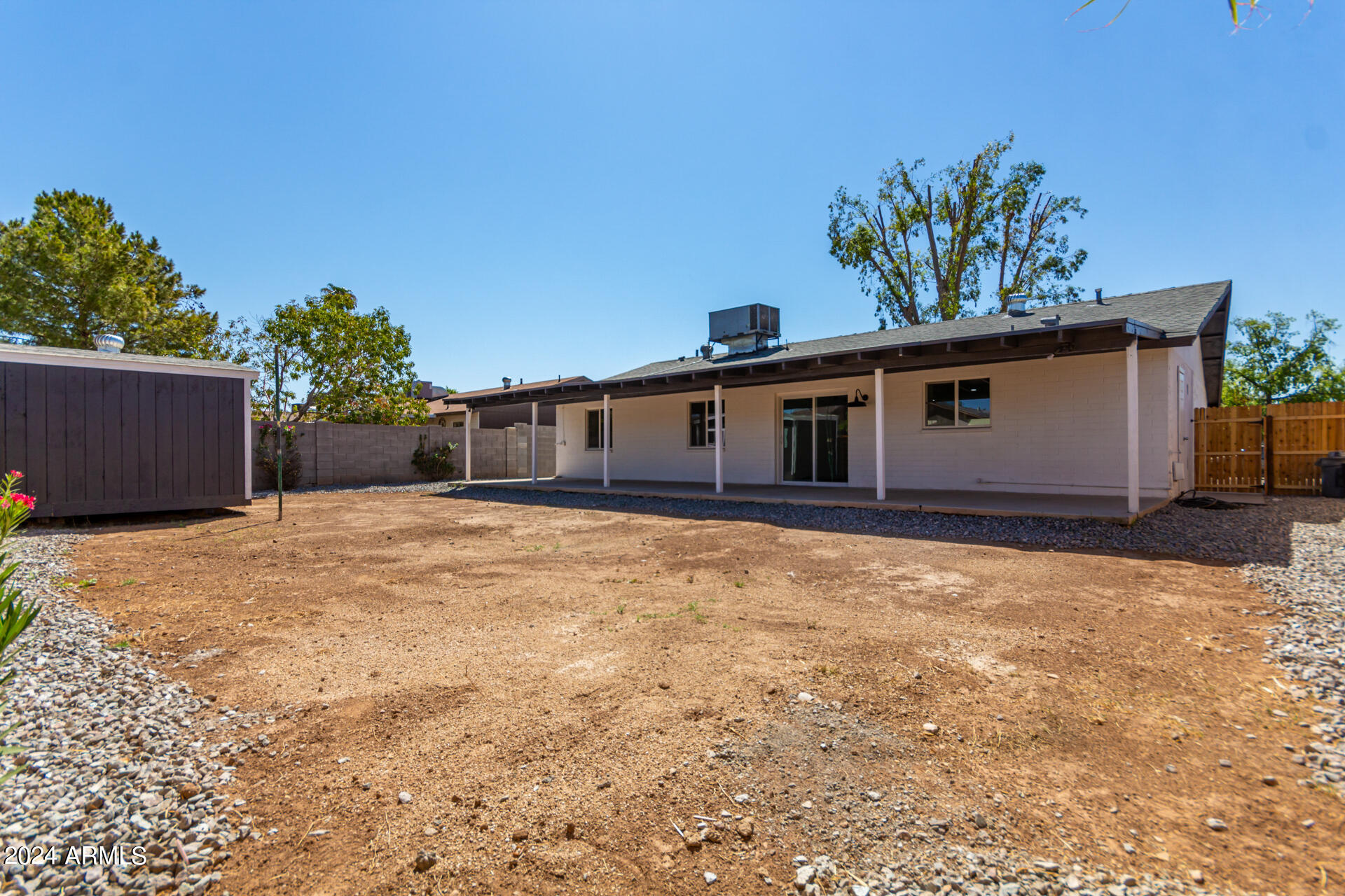5338 West Coronado Road Phoenix, AZ 85035 - Photo 27 of 29 front view of a house with a yard