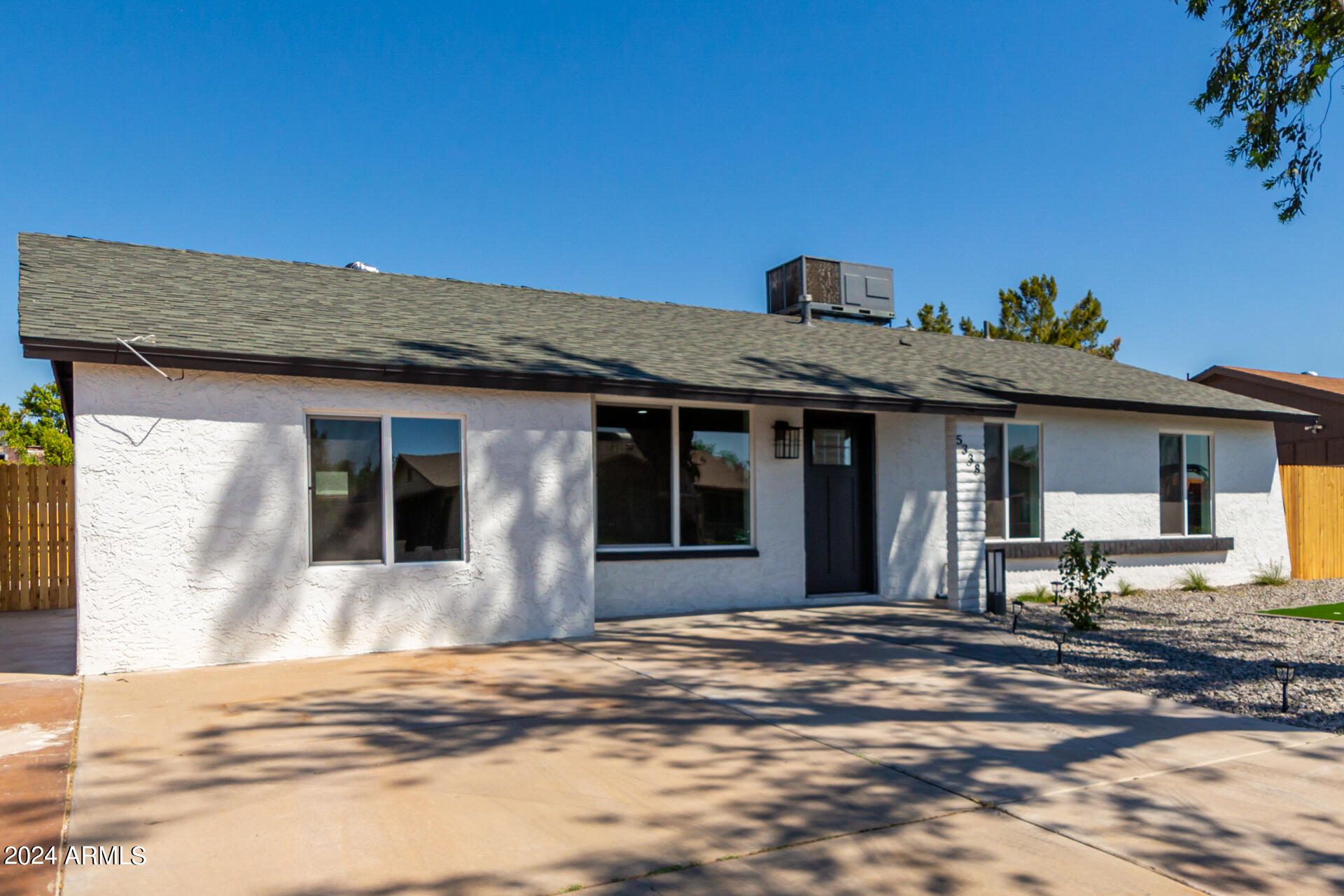 5338 West Coronado Road Phoenix, AZ 85035 - Photo 4 of 29 a front view of a house