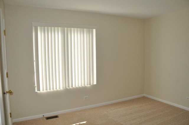 2205 Clipper Court Elgin, IL 60123 - Photo 13 of 24 an empty room with a window