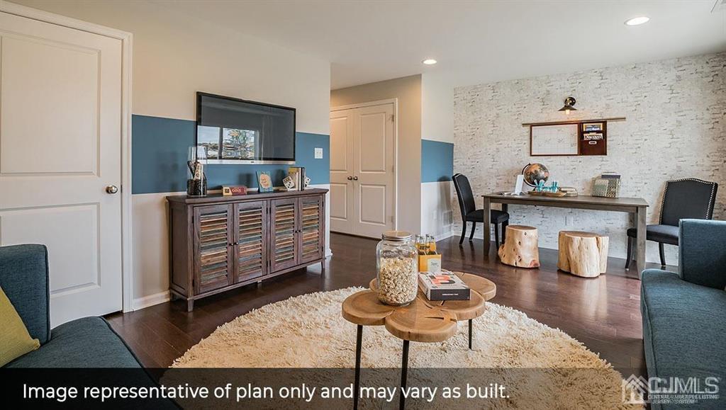 105 Matutina Road Iselin, NJ 08830 - Photo 3 of 20 a living room with furniture and a wooden floor