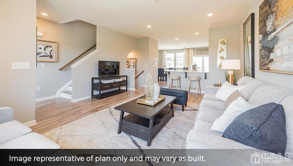 105 Matutina Road Iselin, NJ 08830 - Photo 7 of 20 a living room with furniture and a flat screen tv