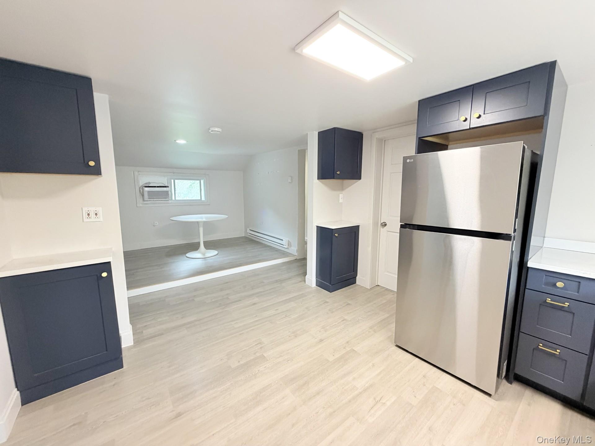 4 Lower Trinity Pass Road Pound Ridge, NY 10576 - Photo 14 of 29 a kitchen with stainless steel appliances a refrigerator and a stove