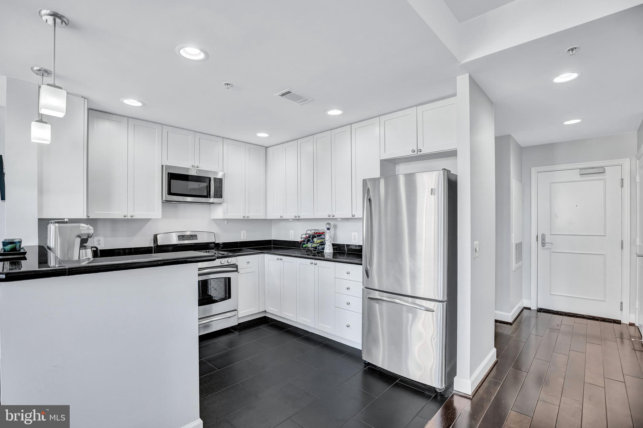 3650 South Glebe Road, Unit 444 Arlington, VA 22202 - Photo 3 of 61 Updated White Kitchen w/ Stainless Steel Appliance