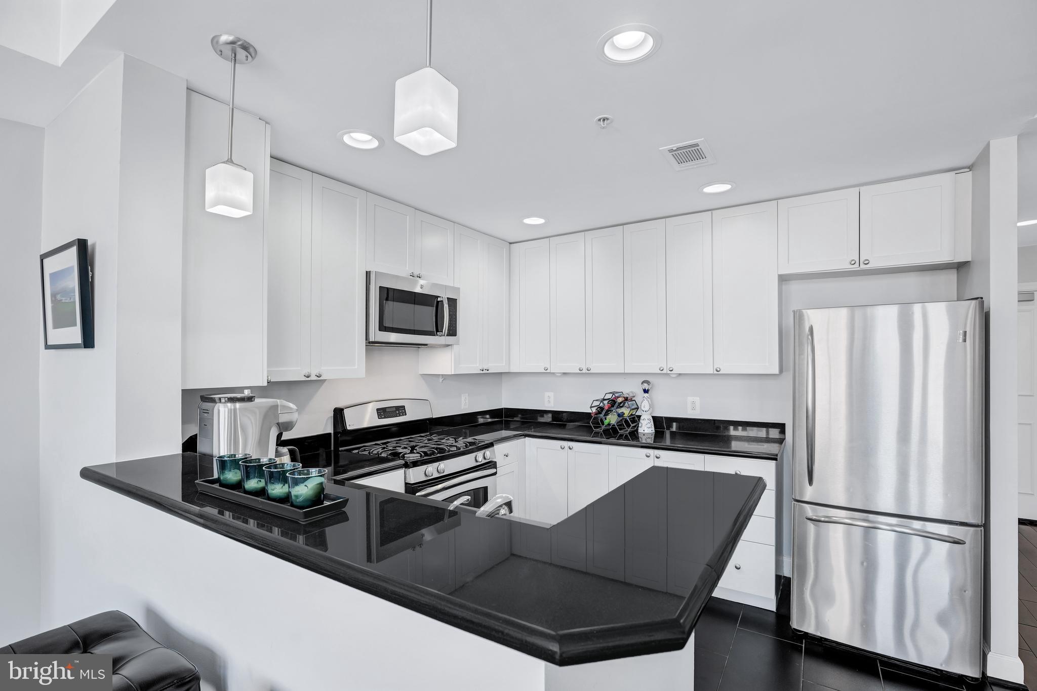 3650 South Glebe Road, Unit 444 Arlington, VA 22202 - Photo 6 of 61 Breakfast Bar with Pendant Lighting