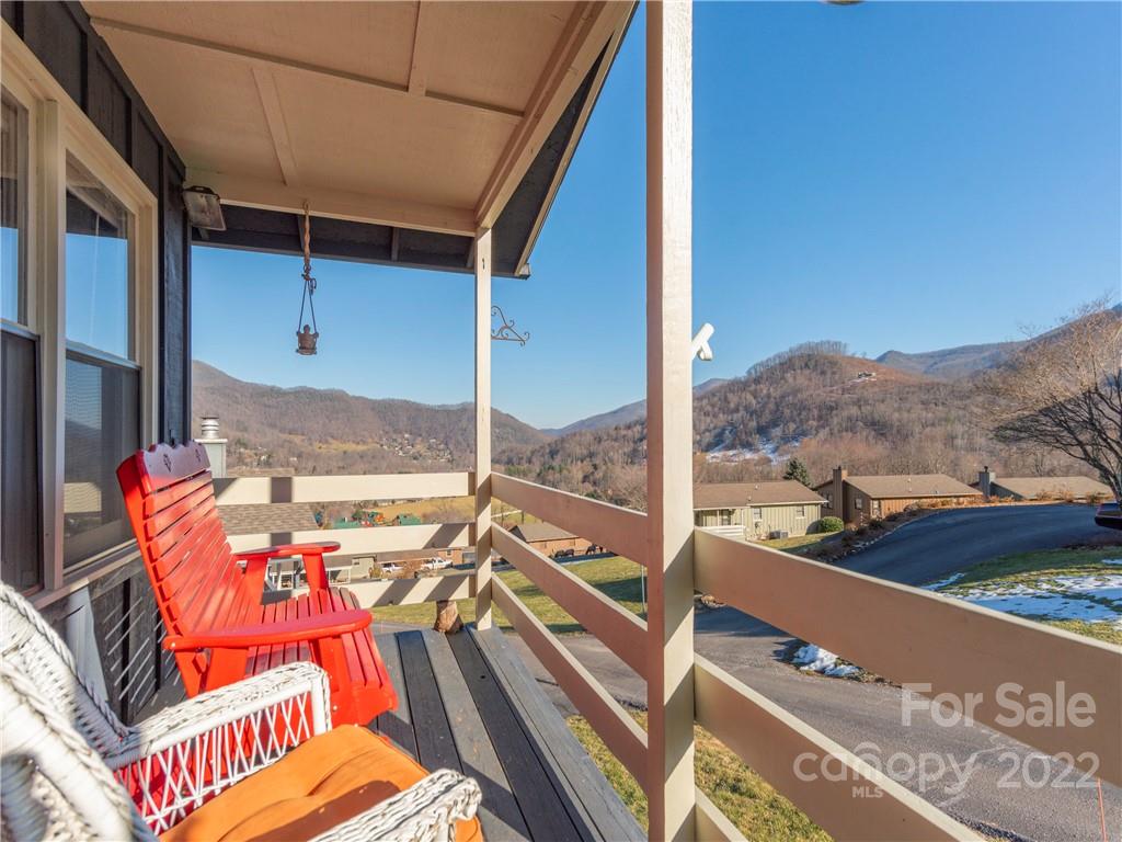 134 Stoney Ridge Loop Maggie Valley, NC 28751 - Photo 3 of 22 a view of an outdoor sitting area with a table