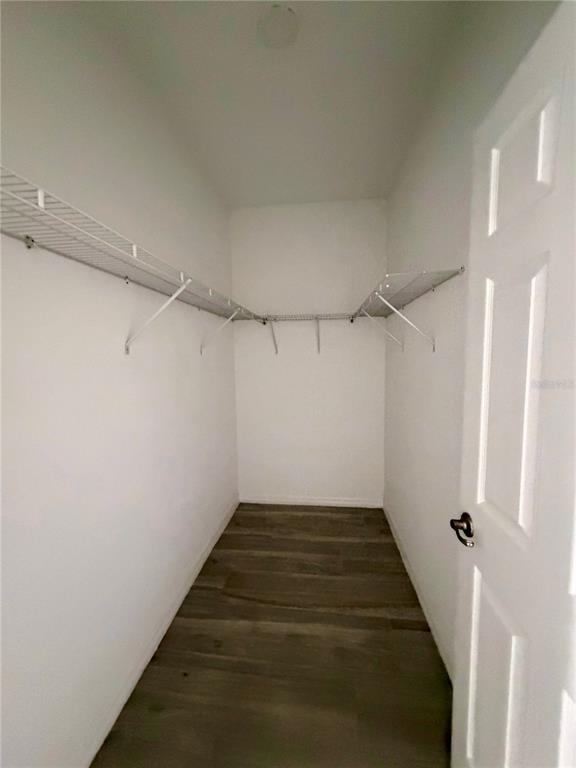 14142 Appleton Boulevard Port Charlotte, FL 33981 - Photo 11 of 26 a view of a room with racks on the wall