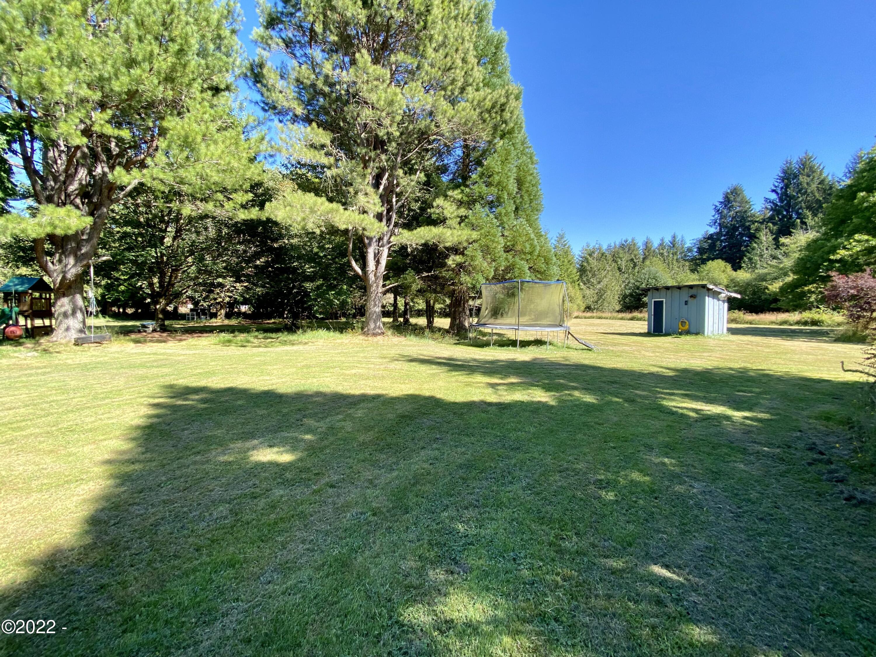 2262 Old River Road Northeast Siletz, OR 97380 - Photo 16 of 18 Yard and Shed