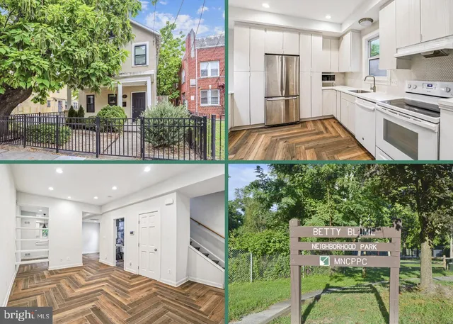 a view of kitchen with stainless steel appliances kitchen island granite countertop a chairs and a stove
