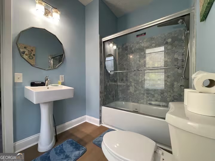 1230 Woodland Avenue Southeast Atlanta, GA 30316 - Photo 12 of 17 a bathroom with a sink toilet and a mirror