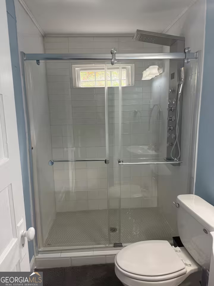 1230 Woodland Avenue Southeast Atlanta, GA 30316 - Photo 15 of 17 a bathroom with a shower and a toilet