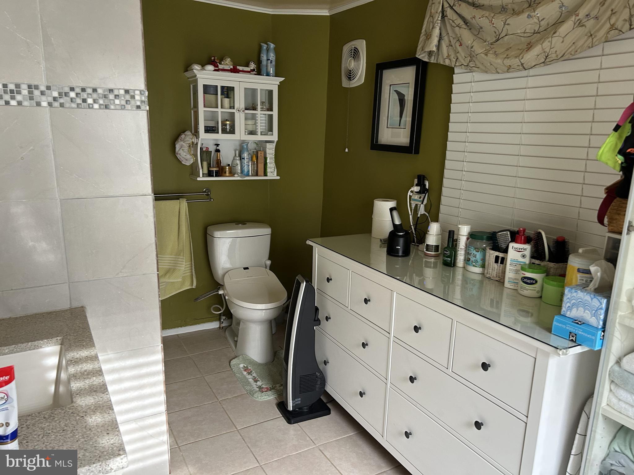 815 Scott Street Baltimore, MD 21230 - Photo 8 of 9 a bathroom with a toilet sink and mirror