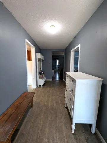 a view of living room with furniture and a window