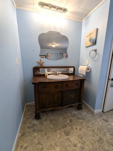 a room with furniture and mirror