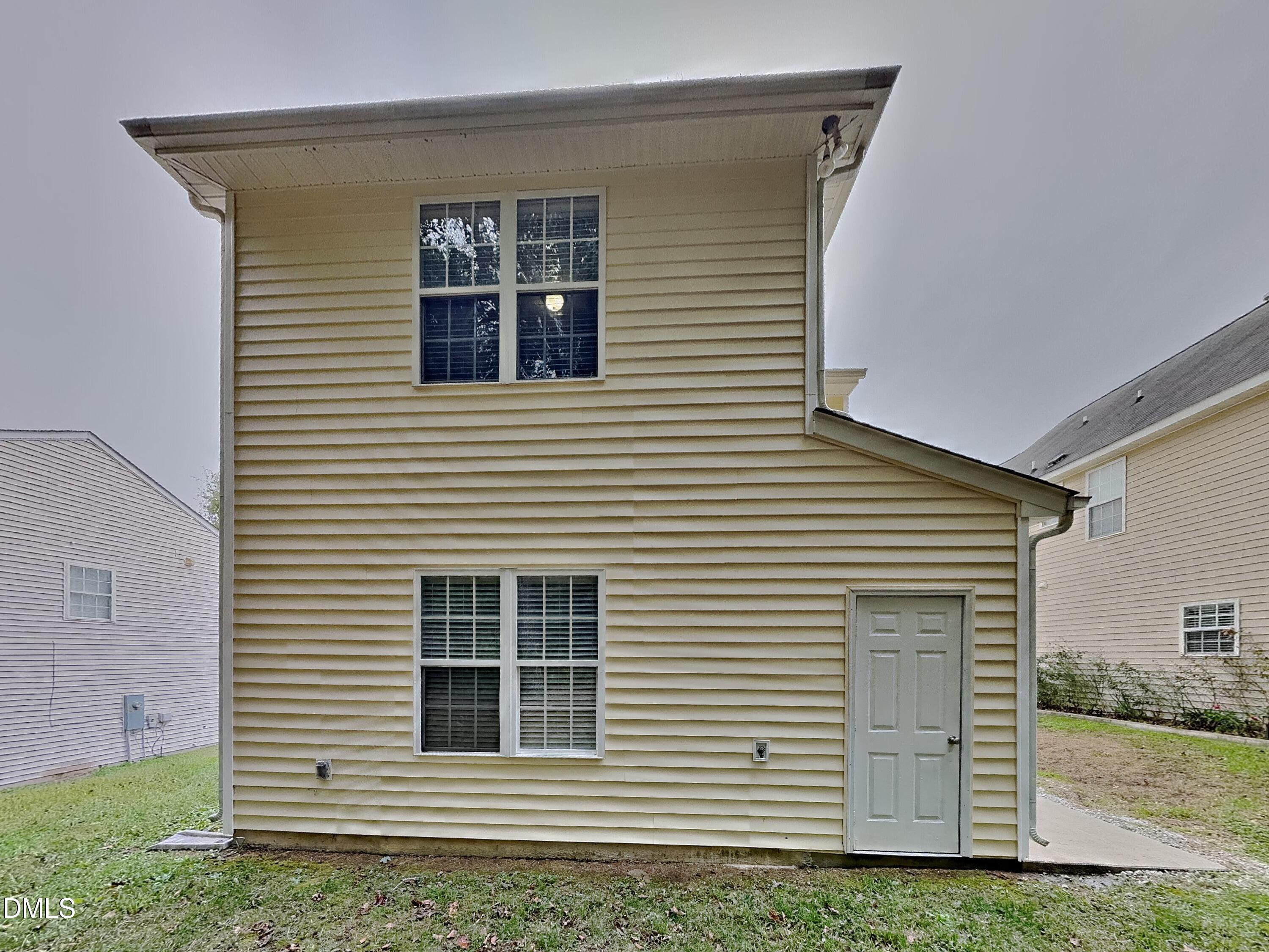 5816 Wynmore Road Raleigh, NC 27610 - Photo 17 of 18 a view of front of house with a window
