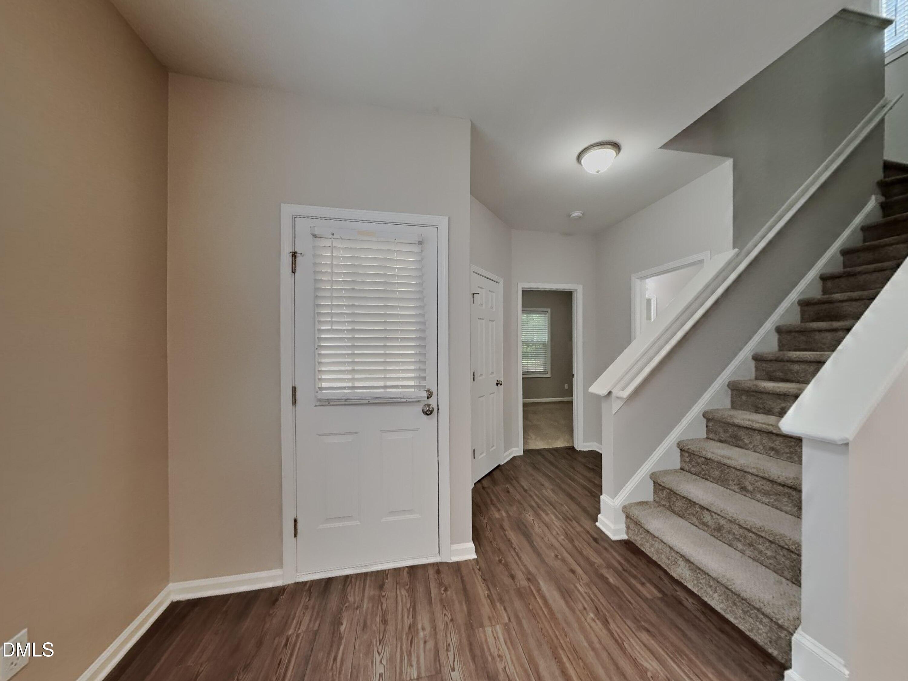5816 Wynmore Road Raleigh, NC 27610 - Photo 4 of 18 a view of entryway with wooden floor