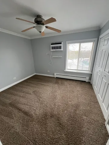 an empty room with a empty space and windows