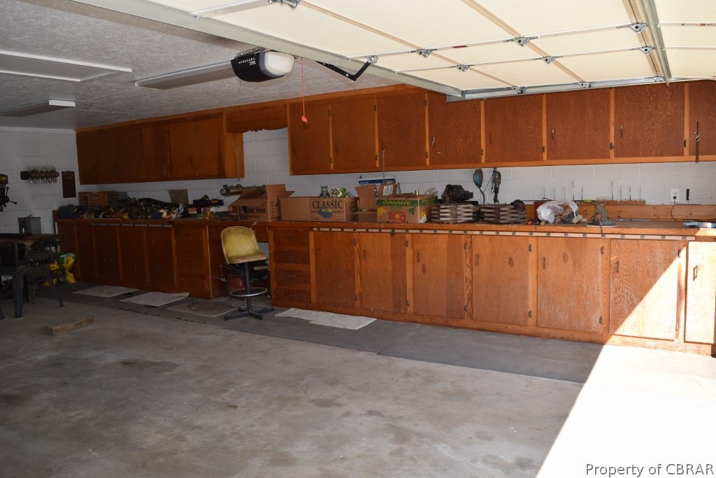 4288 Cedar Bush Road Hayes, VA 23072 - Photo 41 of 48 Detached garage. Lots of cabinetry