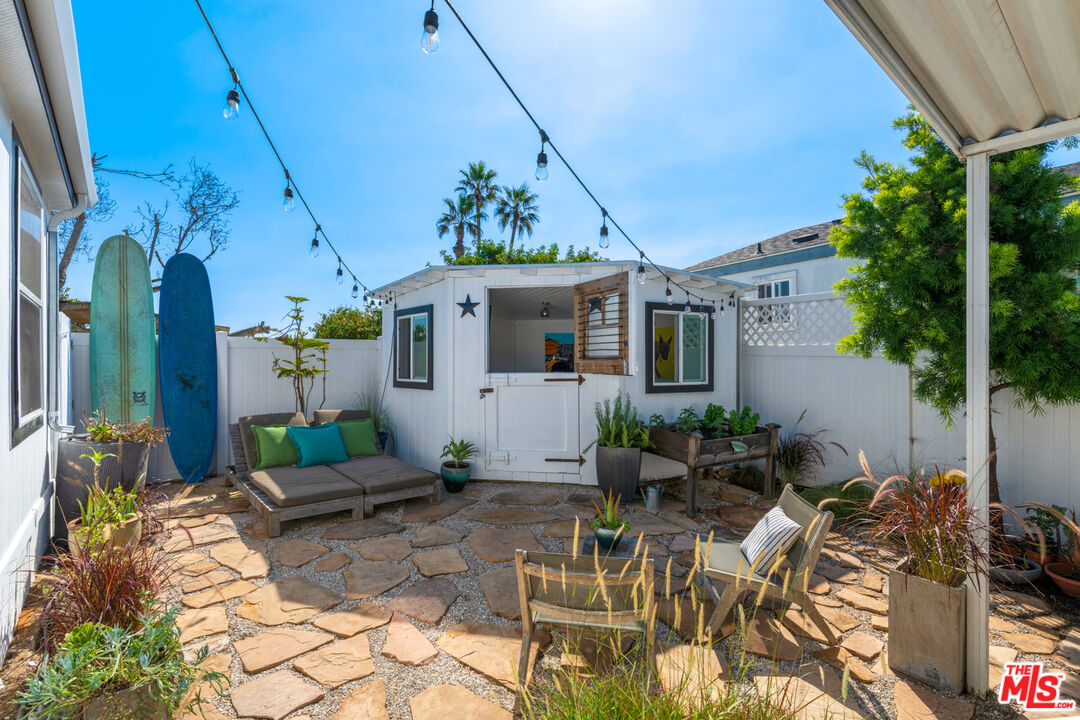 29500 Heathercliff Road, Unit 53 Malibu, CA 90265 - Photo 20 of 24 a front view of a house with sitting area