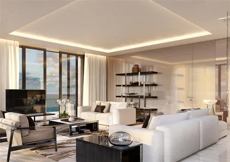 a living room with furniture a flat screen tv and a large window