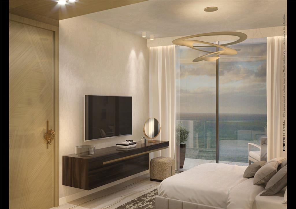 3319 North Ocean Drive, Unit VILLA 8 Hollywood, FL 33019 - Photo 7 of 22 a room with a bed and a mirror