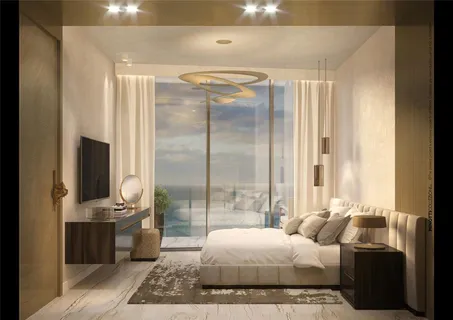 a bedroom with bed and glass door