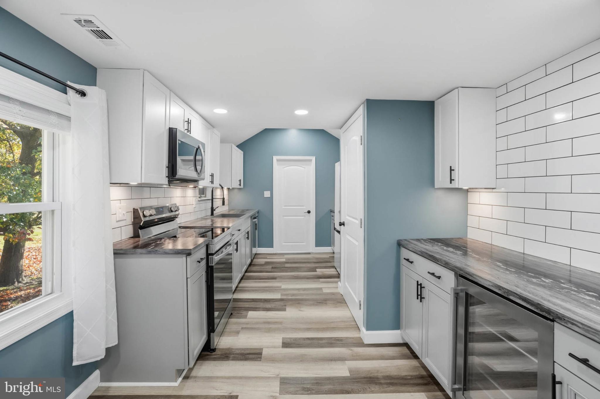 2405 Jerusalem Road Joppa, MD 21085 - Photo 8 of 23 Modern kitchen with sleek finishes and light.