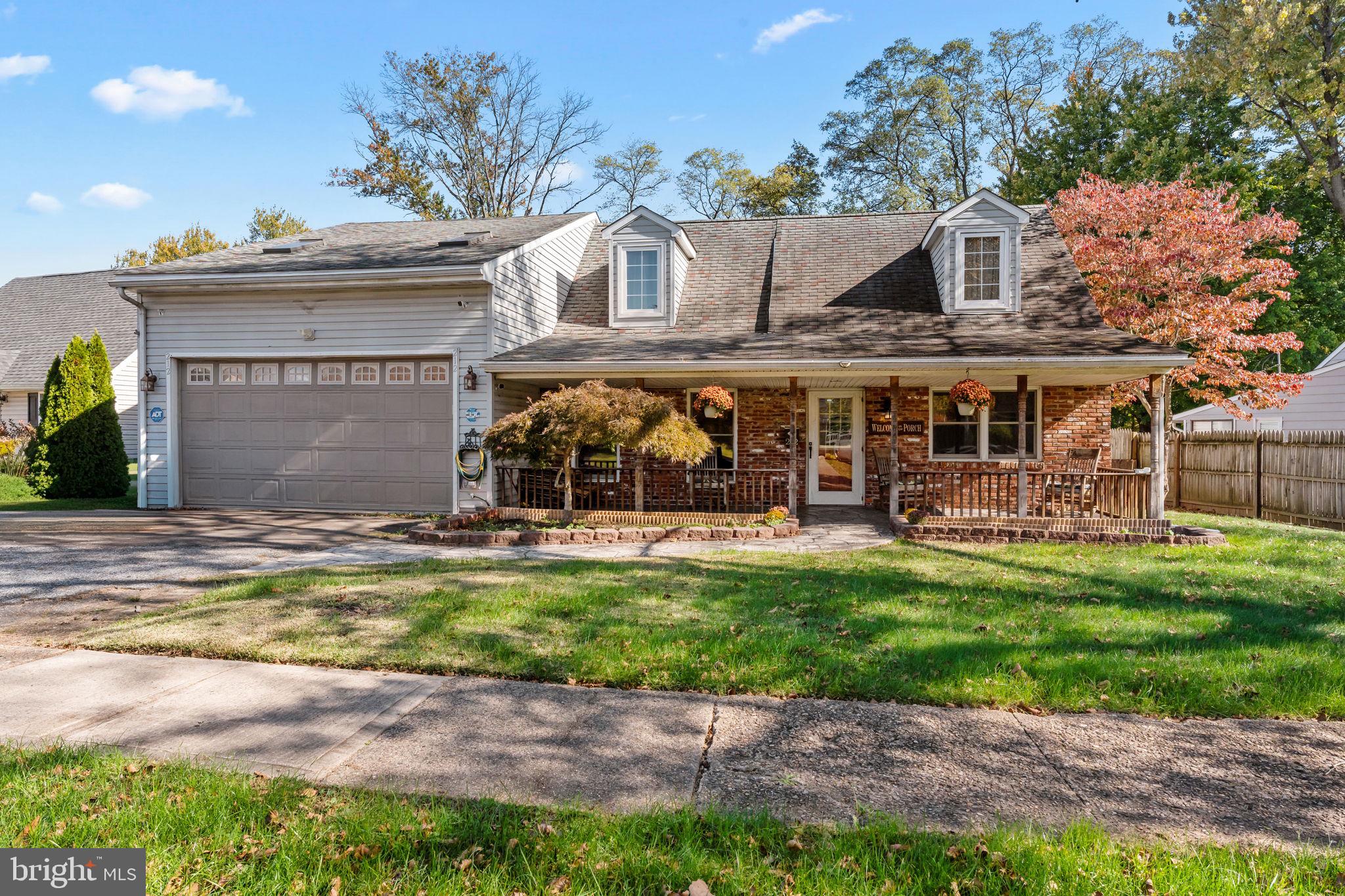 212 Plumbridge Drive Levittown, PA 19056 - Photo 1 of 19 a view of a house with a swimming pool