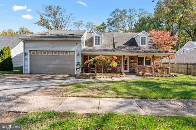 a view of a water fountain in front of a house