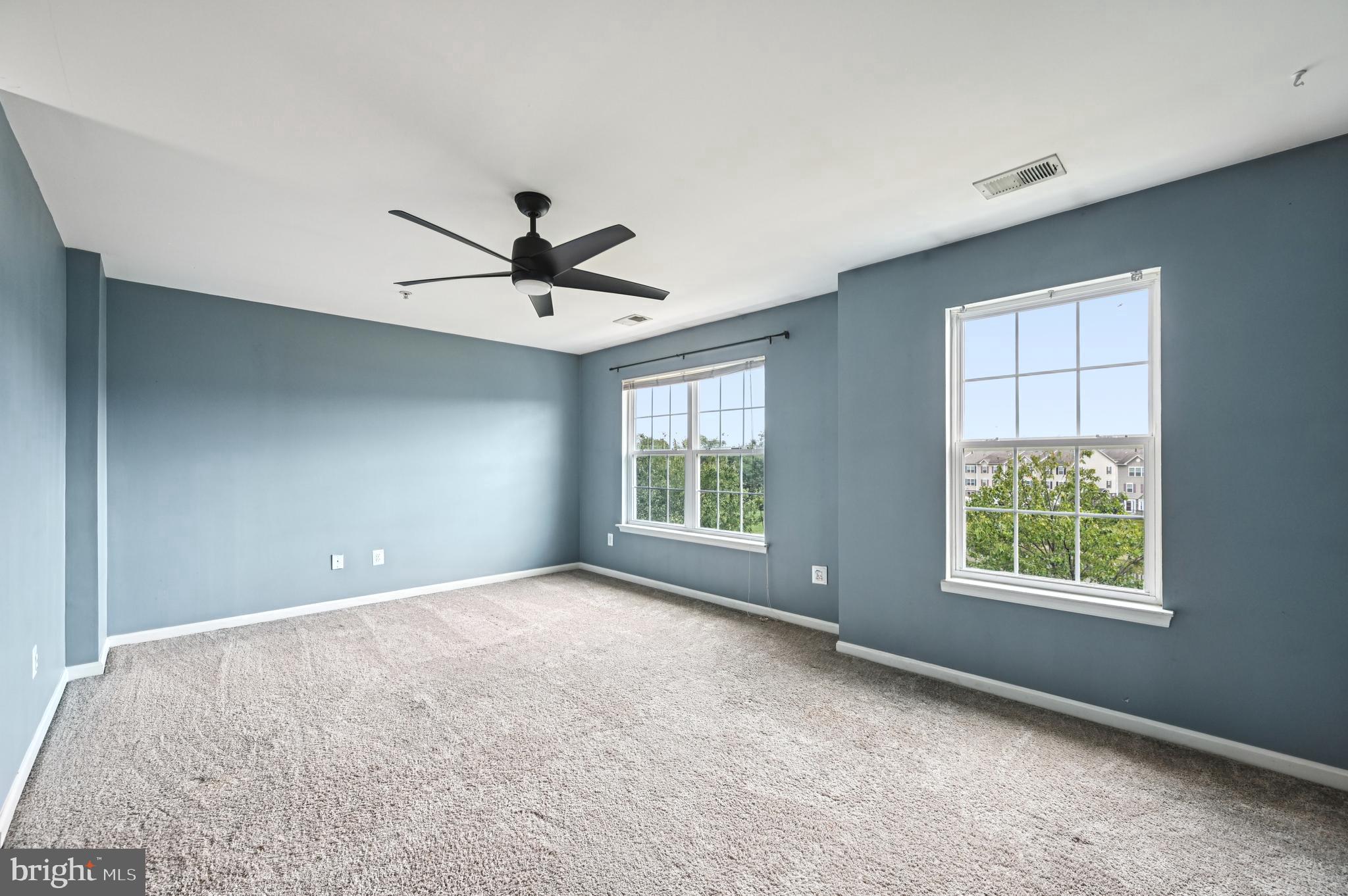 6467 Cornwall Drive, Unit 56 Eldersburg, MD 21784 - Photo 21 of 35 a view of room with window and ceiling fan