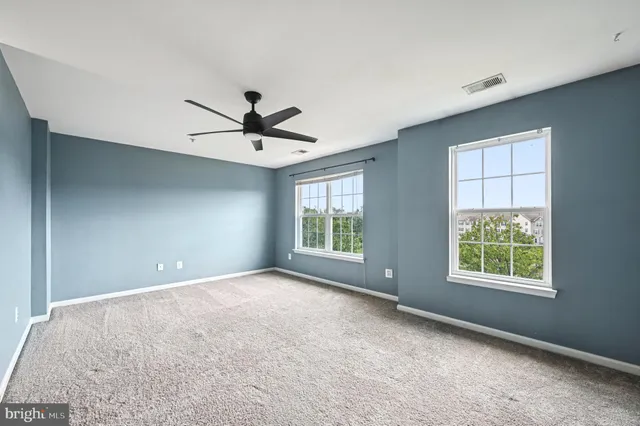a view of a park with swings and a table