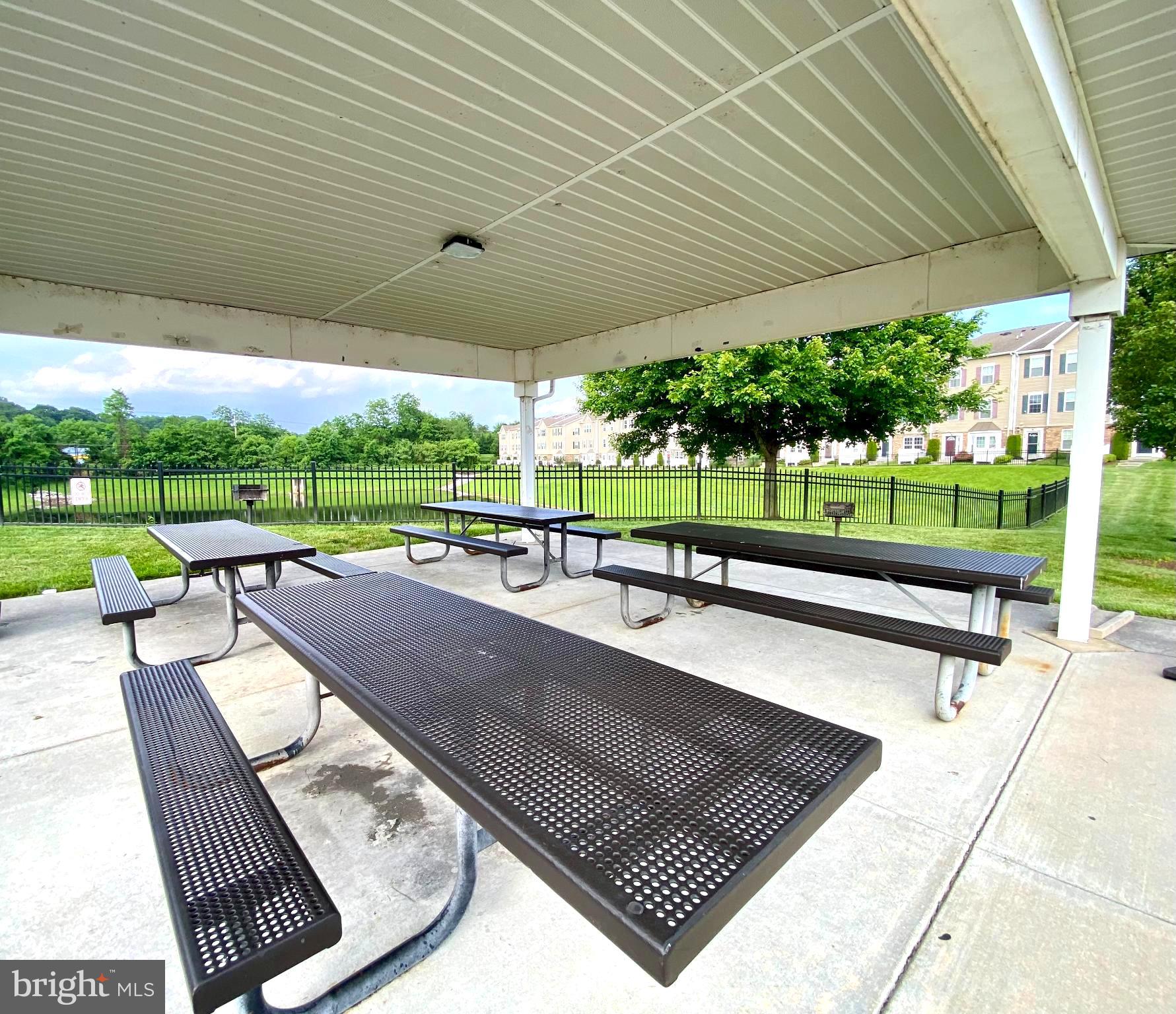 6467 Cornwall Drive, Unit 56 Eldersburg, MD 21784 - Photo 29 of 35 a view of swimming pool with a patio