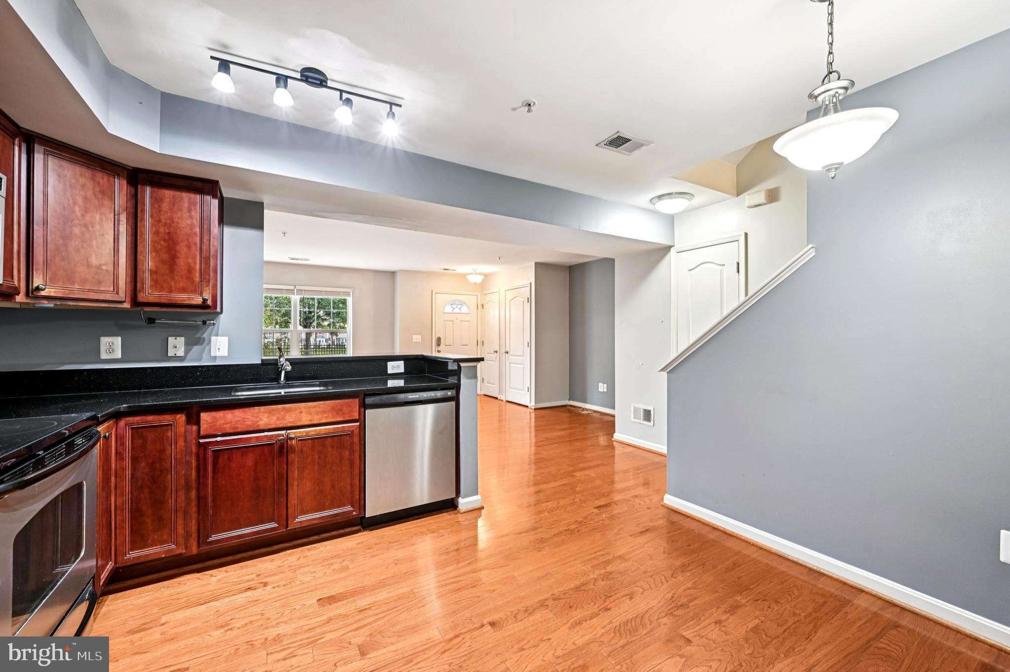 6467 Cornwall Drive, Unit 56 Eldersburg, MD 21784 - Photo 3 of 35 Spacious kitchen with beautiful cabs & granite
