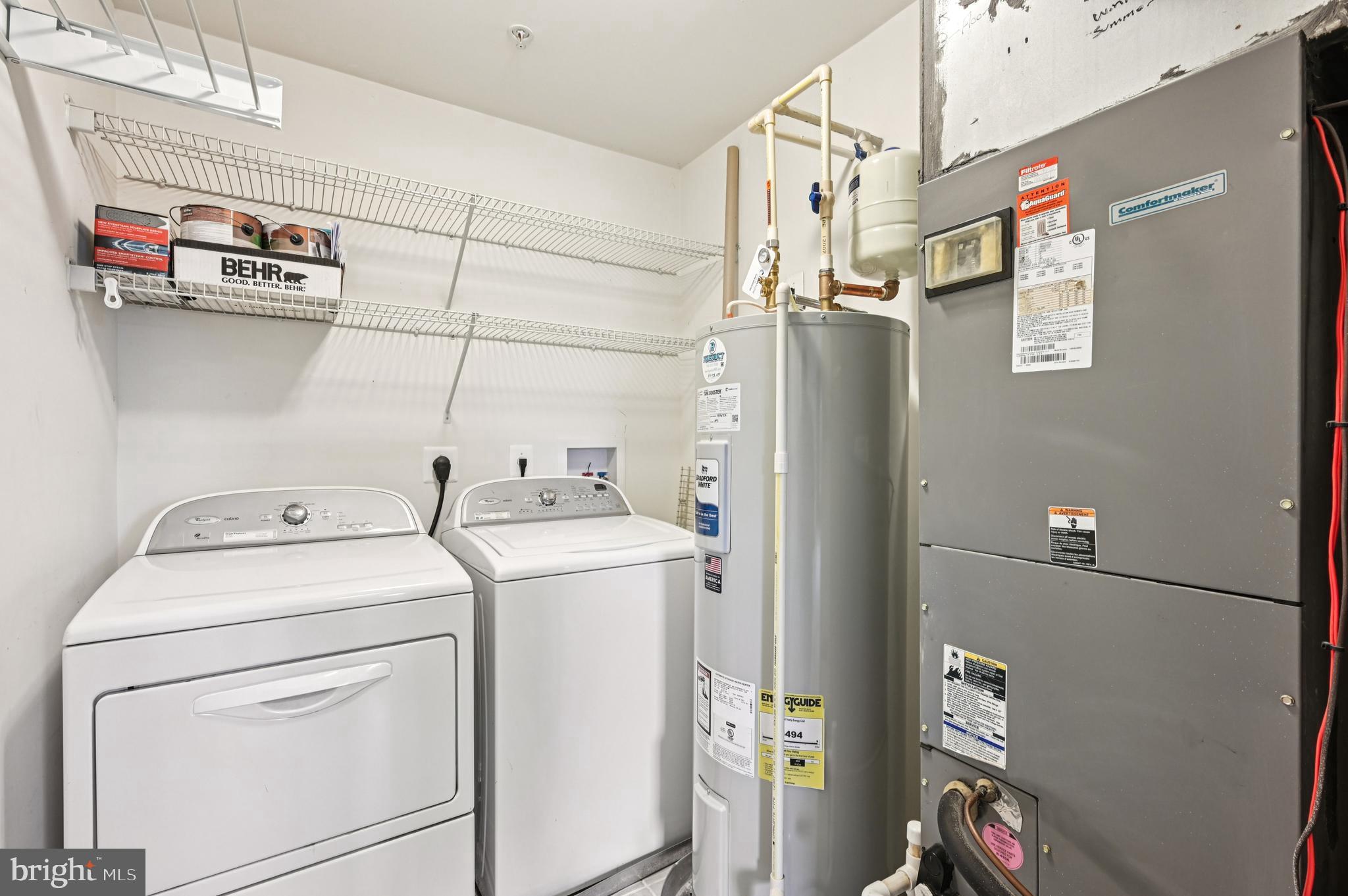 6467 Cornwall Drive, Unit 56 Eldersburg, MD 21784 - Photo 10 of 35 a utility room with dryer and washer