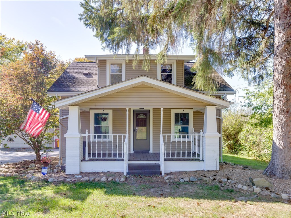 1996 South Cleveland Massillon Road Akron, OH 44321 - Photo 2 of 22 Adorable front porcg, perfect for reading the morning paper with your hot cup of coffee.