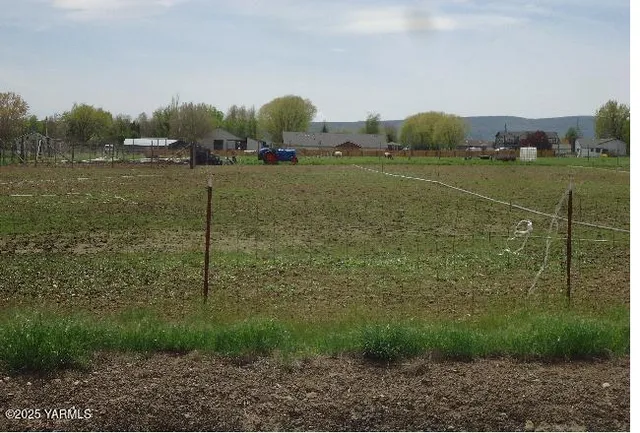 a view of a lake with a big yard