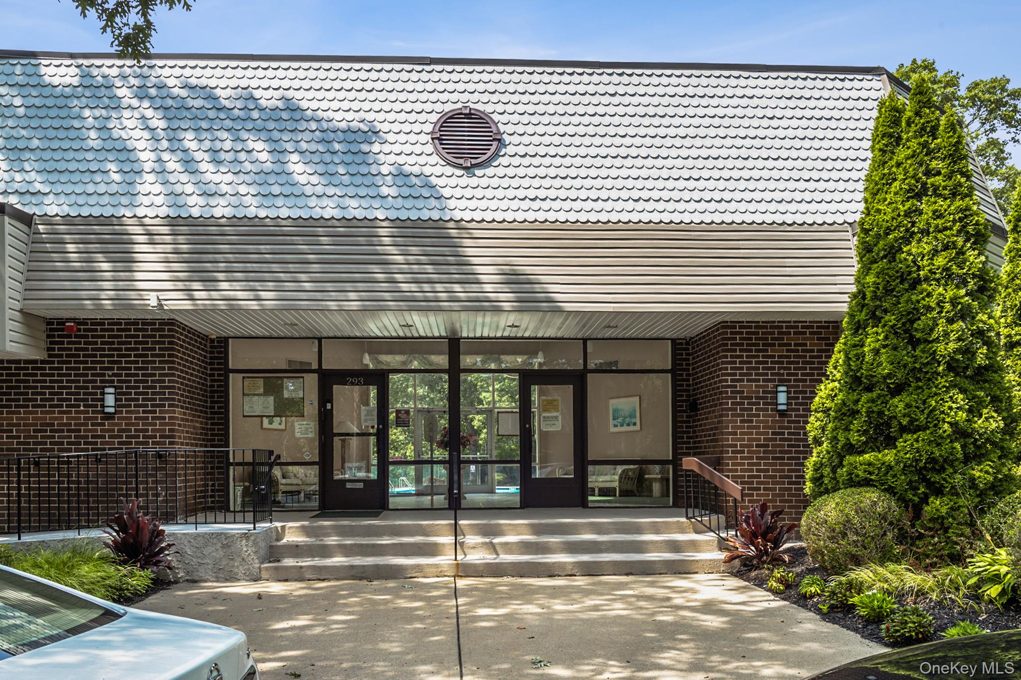100 Glen Hollow Drive Port Jefferson Station, NY 11776 - Photo 17 of 21 a view of a building with a window