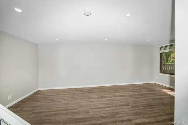 a kitchen with granite countertop a stove and a sink