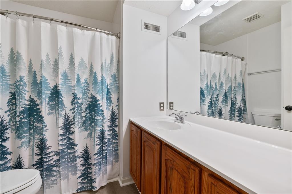 11580 Percheron Circle Irwin, PA 15642 - Photo 20 of 26 a bathroom with a sink and a mirror