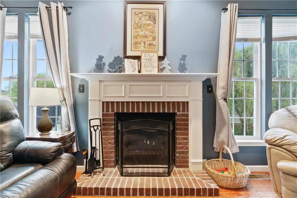 11580 Percheron Circle Irwin, PA 15642 - Photo 8 of 26 a living room with furniture a window and a fireplace