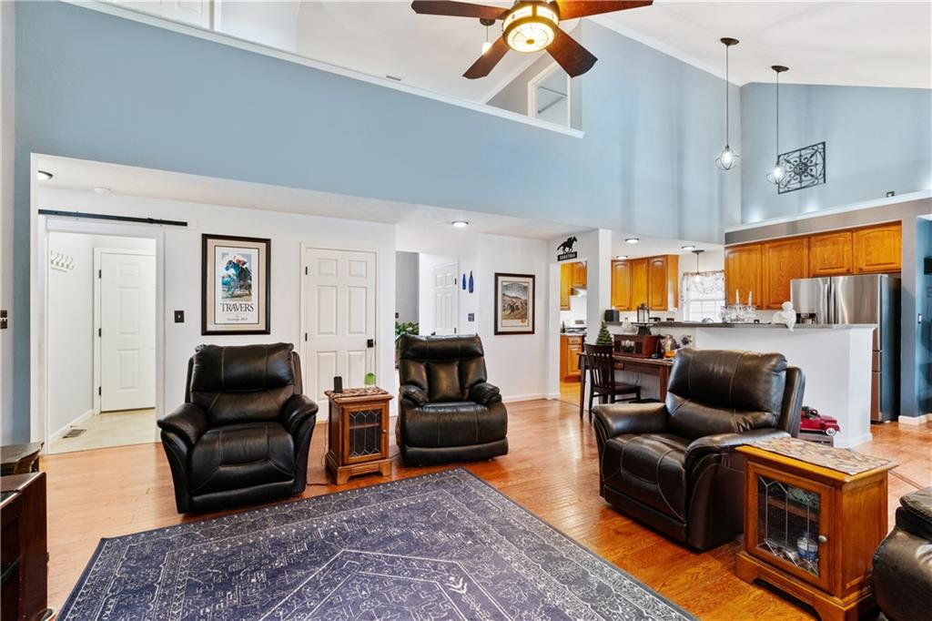 11580 Percheron Circle Irwin, PA 15642 - Photo 9 of 26 a living room with furniture and a flat screen tv
