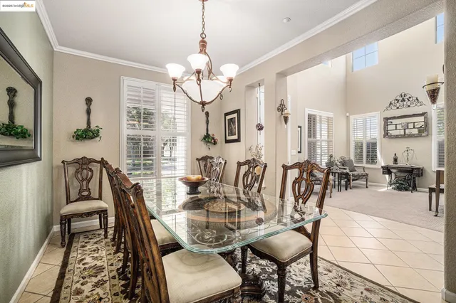 a view of a livingroom with furniture and a flat screen tv