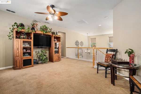 a spacious bathroom with a tub sink shower and mirror