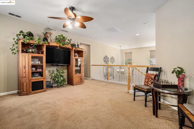 a spacious bathroom with a tub sink shower and mirror