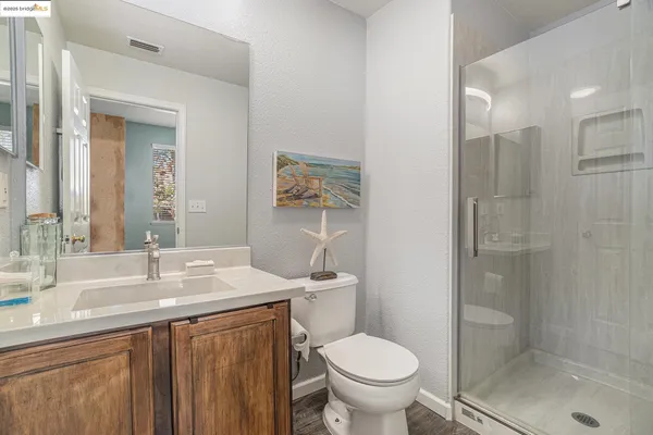 a backyard of a house with outdoor seating