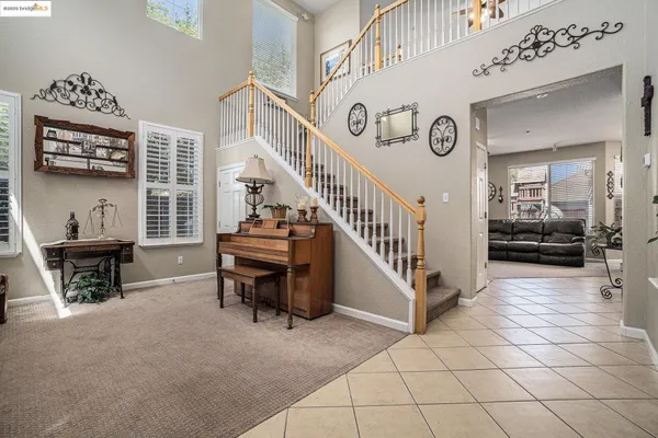 a view of entryway and hall with dining room