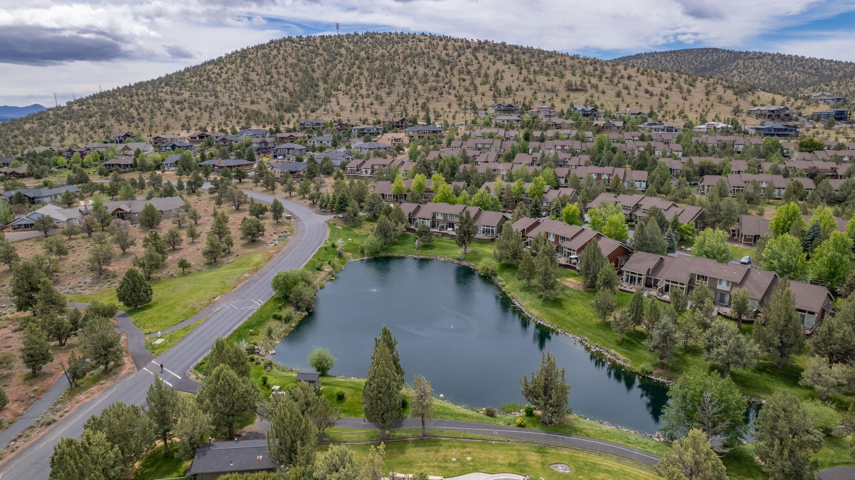 9009 Merlin Drive Redmond, OR 97756 - Photo 92 of 98 a view of a lake with a mountain in the background