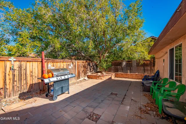a backyard of a house with seating space